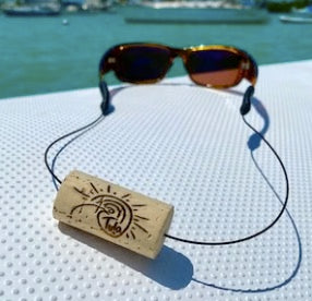 KORKZ custom laser engraved sunglass strap worn outdoors featuring personalized cork engraving perfect corporate retreat swag gift